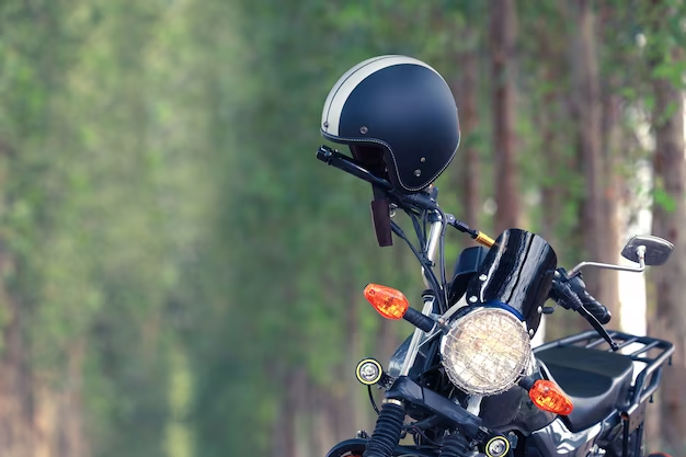 A motorcycle and a helmet hanging on it